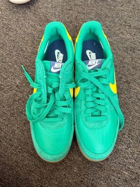 Green Nikes with Yellow Swoosh